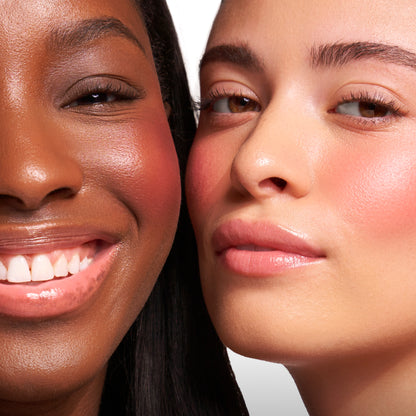 Finest Hour [A close up of two models with Tower 28 Beauty's BeachPlease Cream Blush in Finest Hour on their faces.