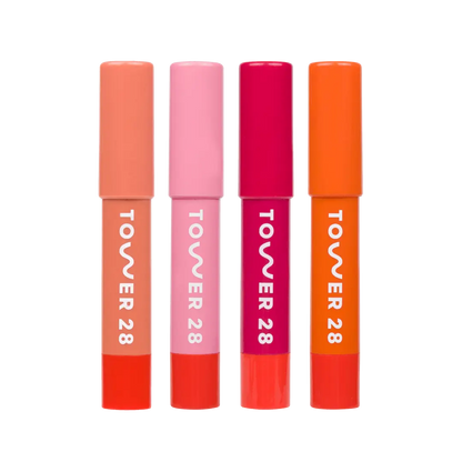 JuiceBalm Lip Balm Set [Shared: A close up of all four shades in Tower 28 Beauty's JuiceBalm Set: Drink, Shake, Mix, and Squeeze.]